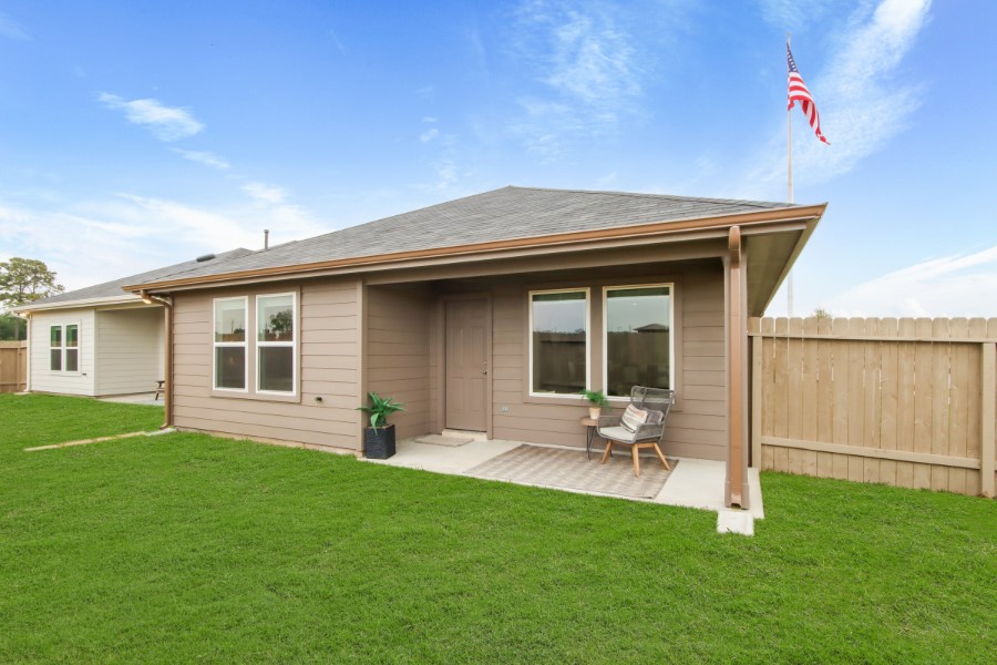 16903 Vinters Way Houston, TX 77090 - Photo 26 of 29 a house view with a garden space