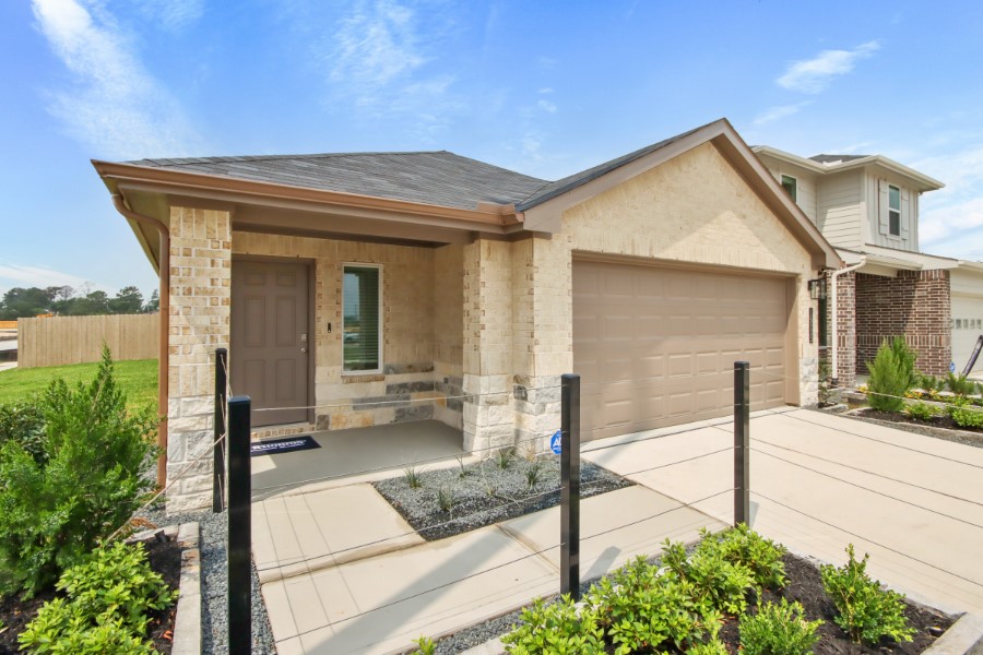 16903 Vinters Way Houston, TX 77090 - Photo 3 of 29 a view of house with yard