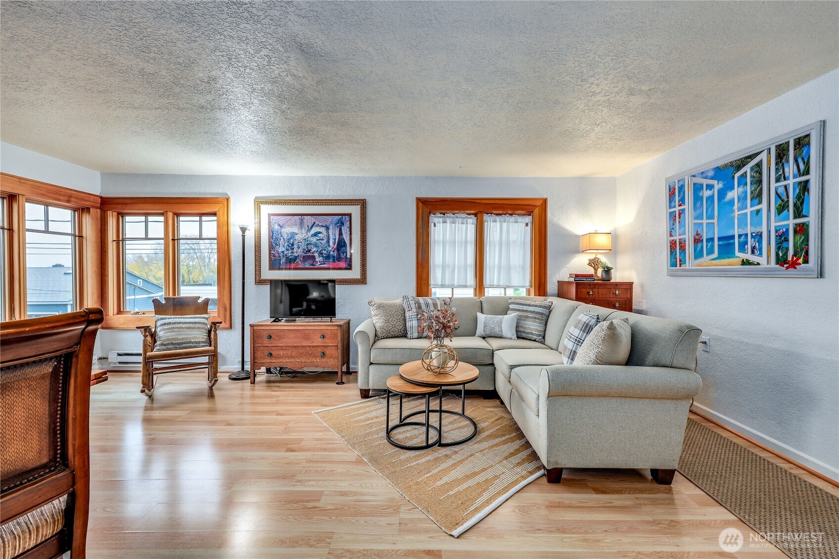 717 Franklin Street Port Townsend, WA 98368 - Photo 12 of 40 a living room with furniture and a floor to ceiling window