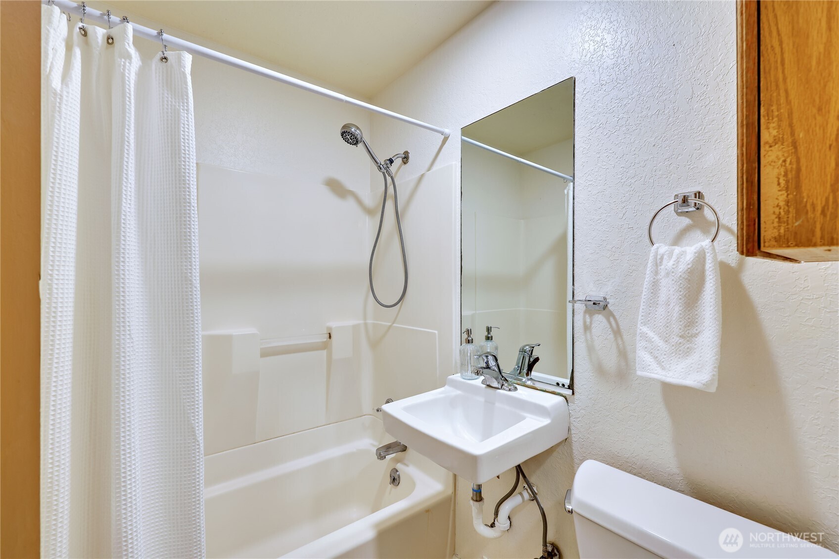 717 Franklin Street Port Townsend, WA 98368 - Photo 20 of 40 a bathroom with a sink mirror toilet and shower