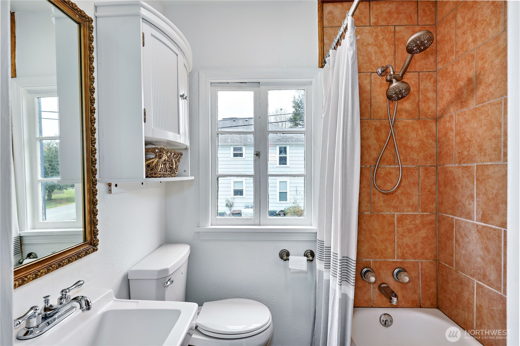 717 Franklin Street Port Townsend, WA 98368 - Photo 22 of 40 a bathroom with a toilet sink and shower