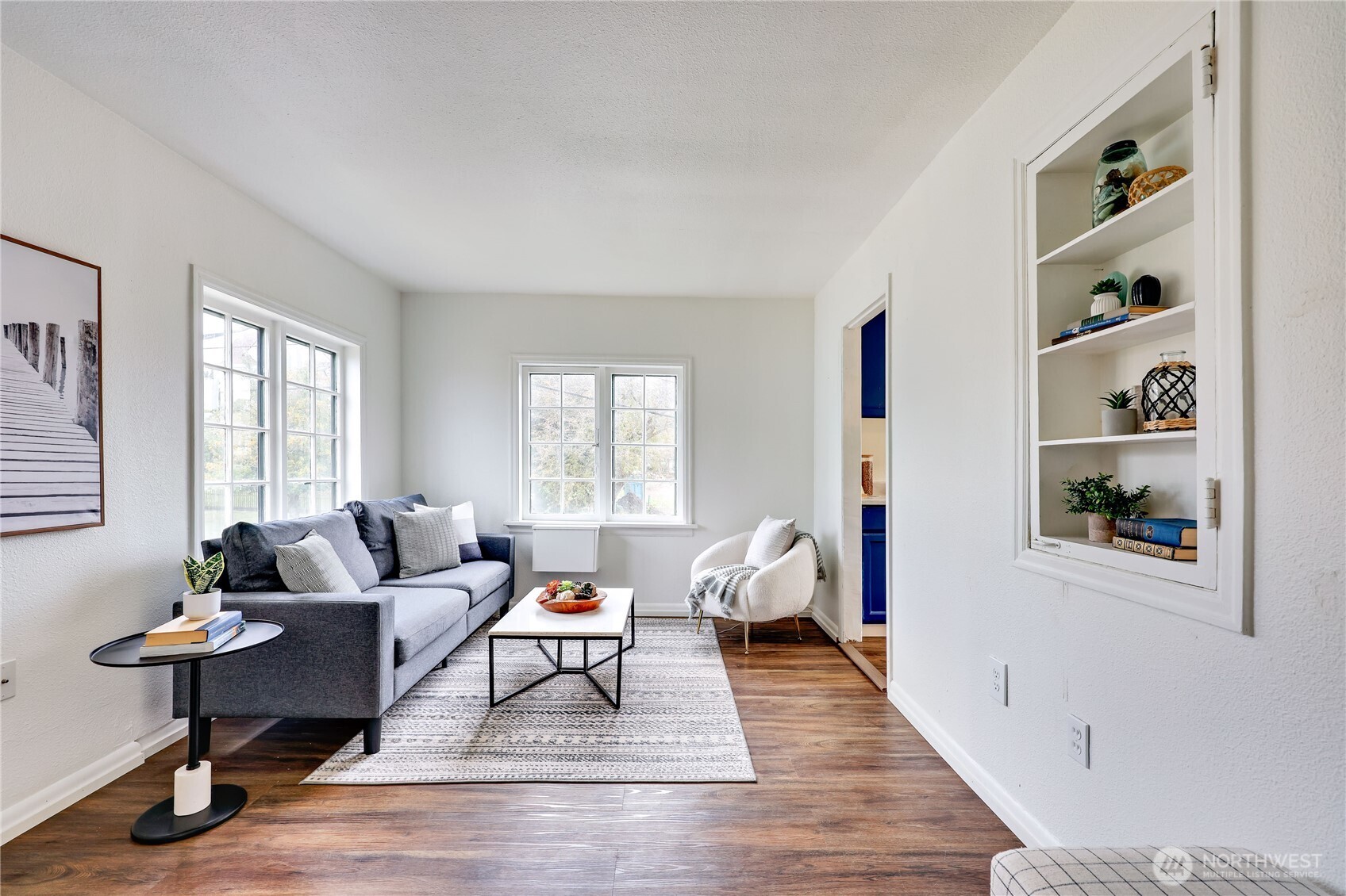 717 Franklin Street Port Townsend, WA 98368 - Photo 23 of 40 a living room with furniture and a wooden floor