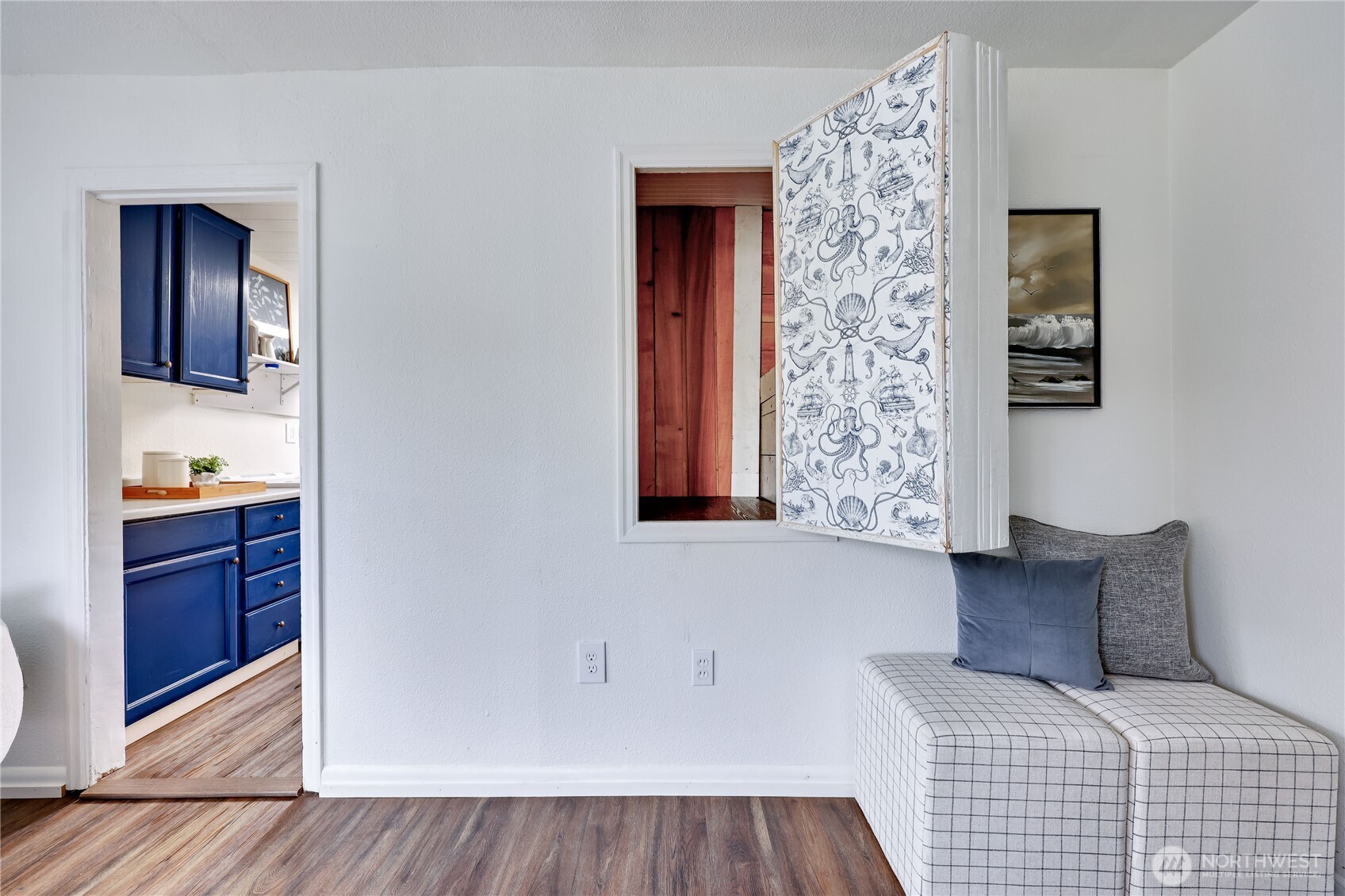 717 Franklin Street Port Townsend, WA 98368 - Photo 27 of 40 a large bedroom with bed and wooden floor