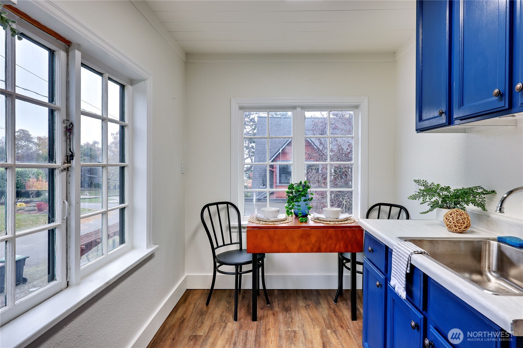 717 Franklin Street Port Townsend, WA 98368 - Photo 29 of 40 a view of a dining room with furniture window and outside view