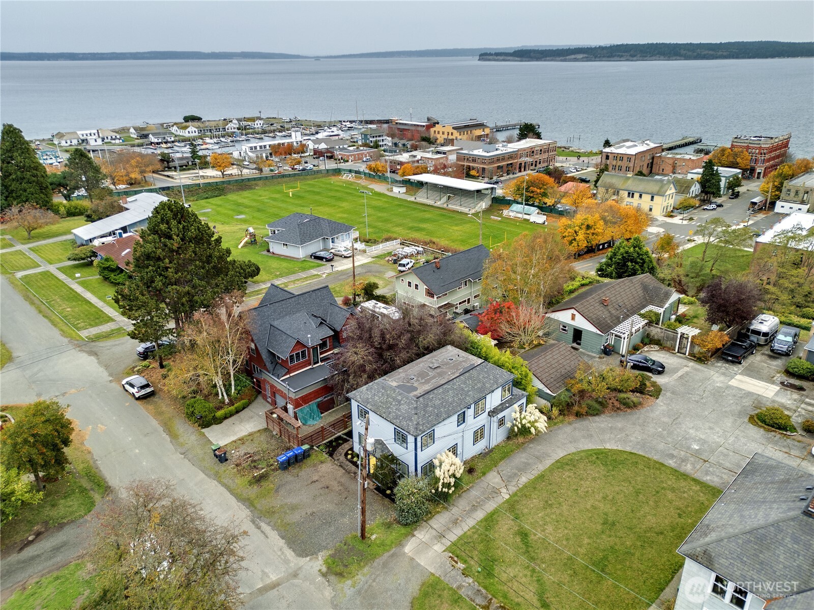 717 Franklin Street Port Townsend, WA 98368 - Photo 36 of 40 an aerial view of a house with a swimming pool and outdoor seating