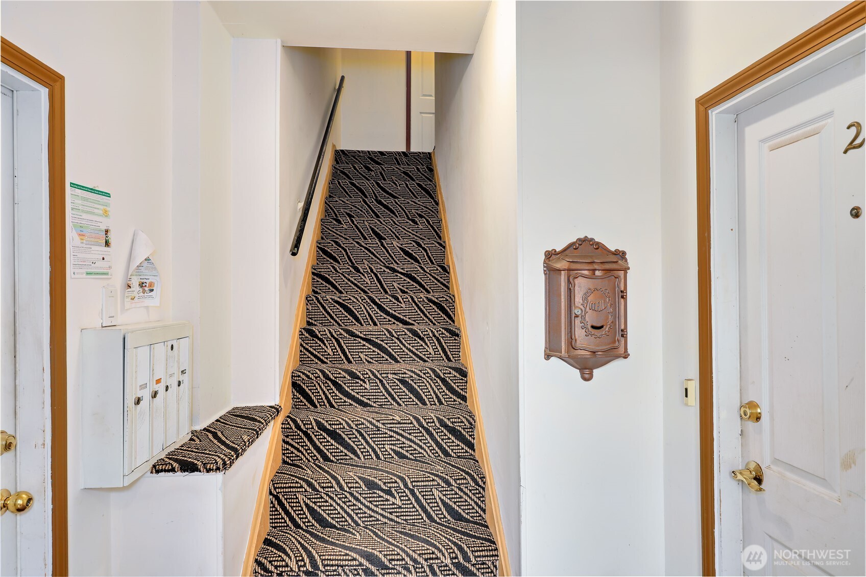 717 Franklin Street Port Townsend, WA 98368 - Photo 10 of 40 a view of a hallway with wooden floor