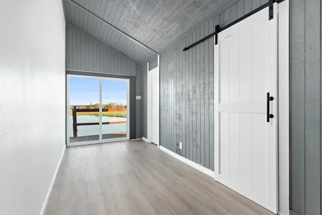 a bathroom with a tub and a shower