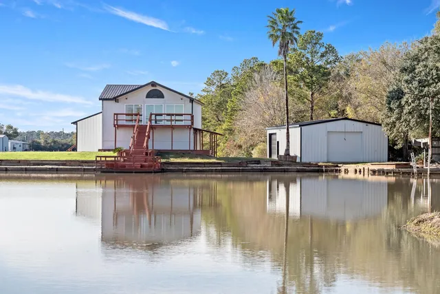 a view of a lake with a building in the background