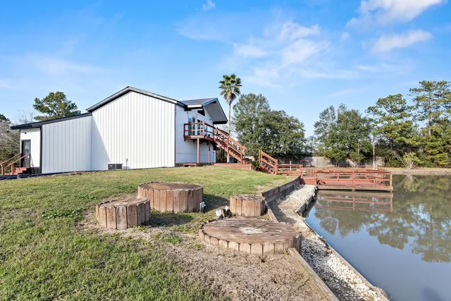a view of garage and yard