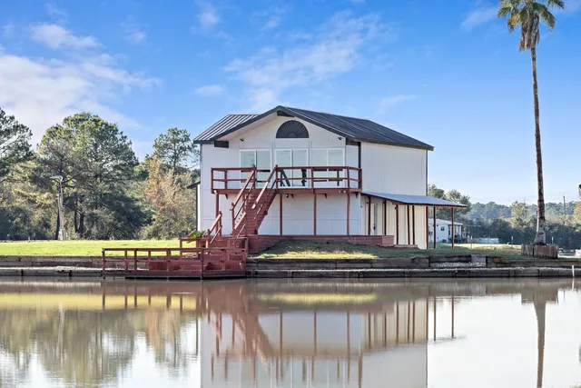 a view of a house with a road