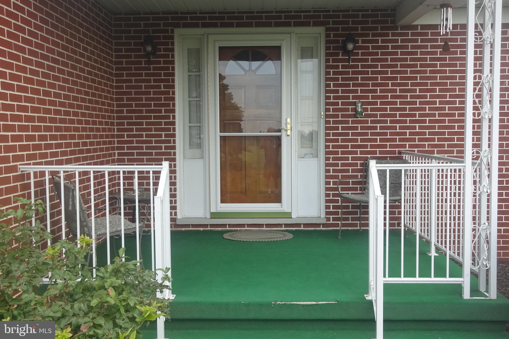 1009 Brechbill Road Chambersburg, PA 17202 - Photo 5 of 42 Sit on the front porch