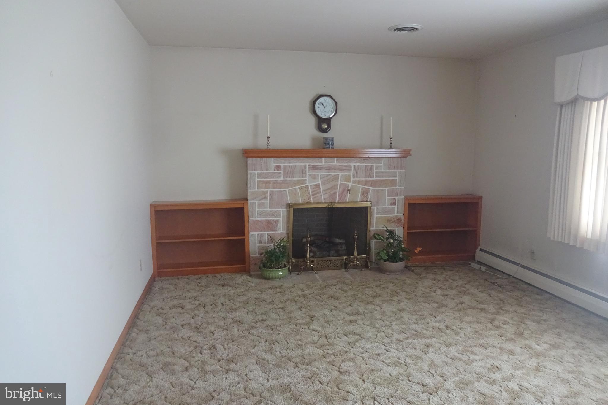1009 Brechbill Road Chambersburg, PA 17202 - Photo 7 of 42 Living room fireplace