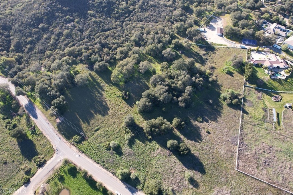 0 Tenaja Road Murrieta, CA 92562 - Photo 2 of 28 a view of a yard with wooden fence