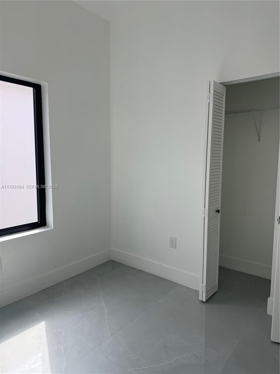2970 Northwest 45th Street Miami, FL 33142 - Photo 16 of 26 a view of room and window