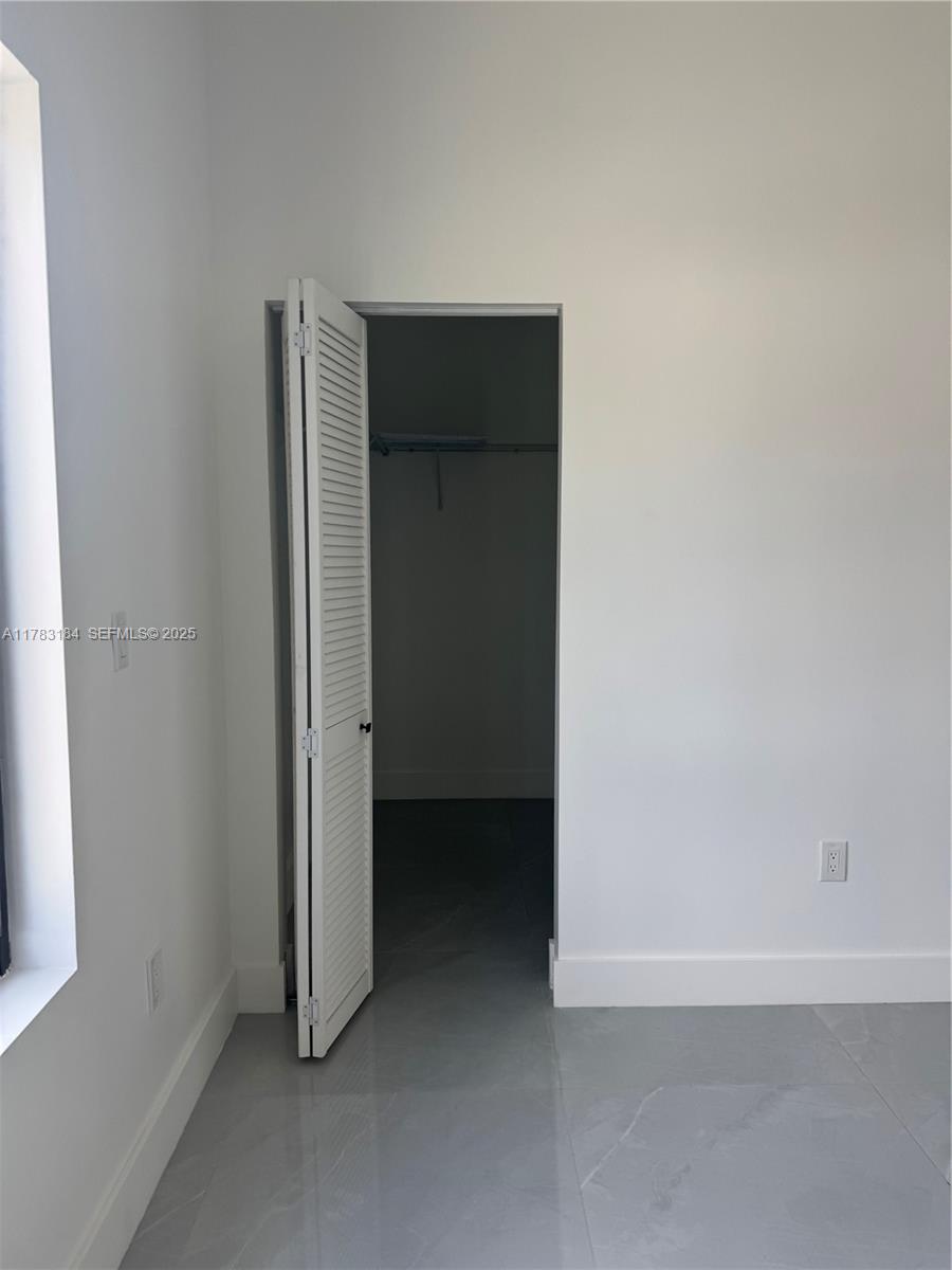 2970 Northwest 45th Street Miami, FL 33142 - Photo 26 of 26 a view of an empty room