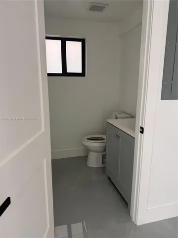 a bathroom with a toilet