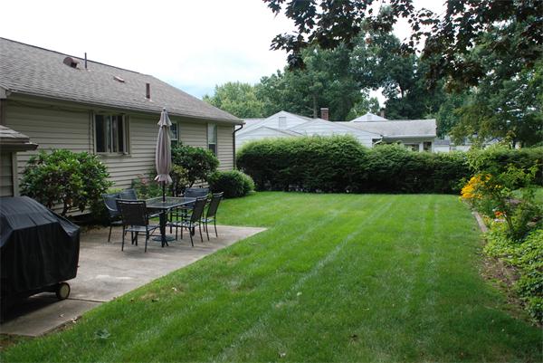 38 Endecott Street Springfield, MA 01118 - Photo 13 of 17 a view of a house with patio