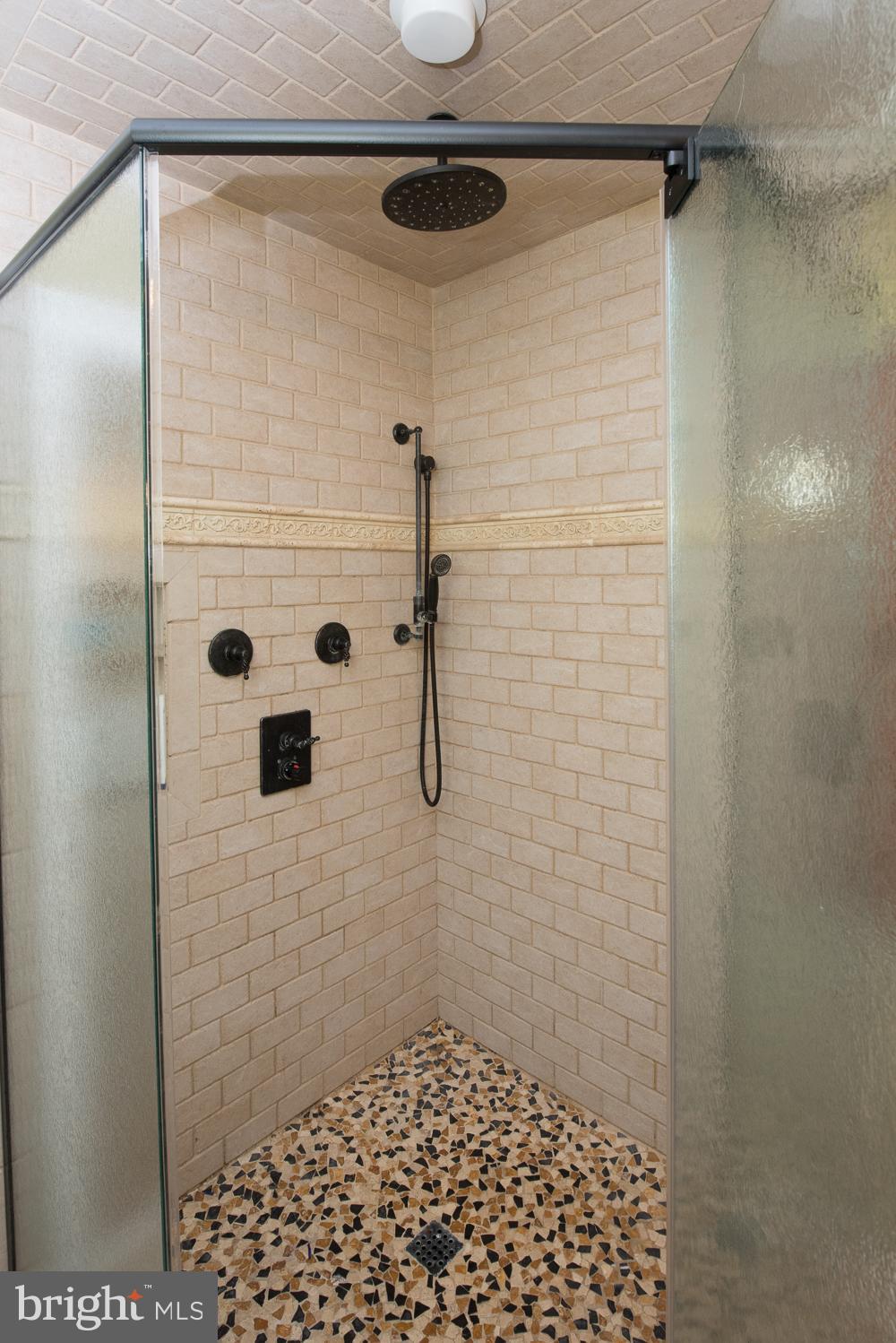 406 Homestead Road Wayne, PA 19087 - Photo 21 of 39 Master Bath with body spray and rain head shower.