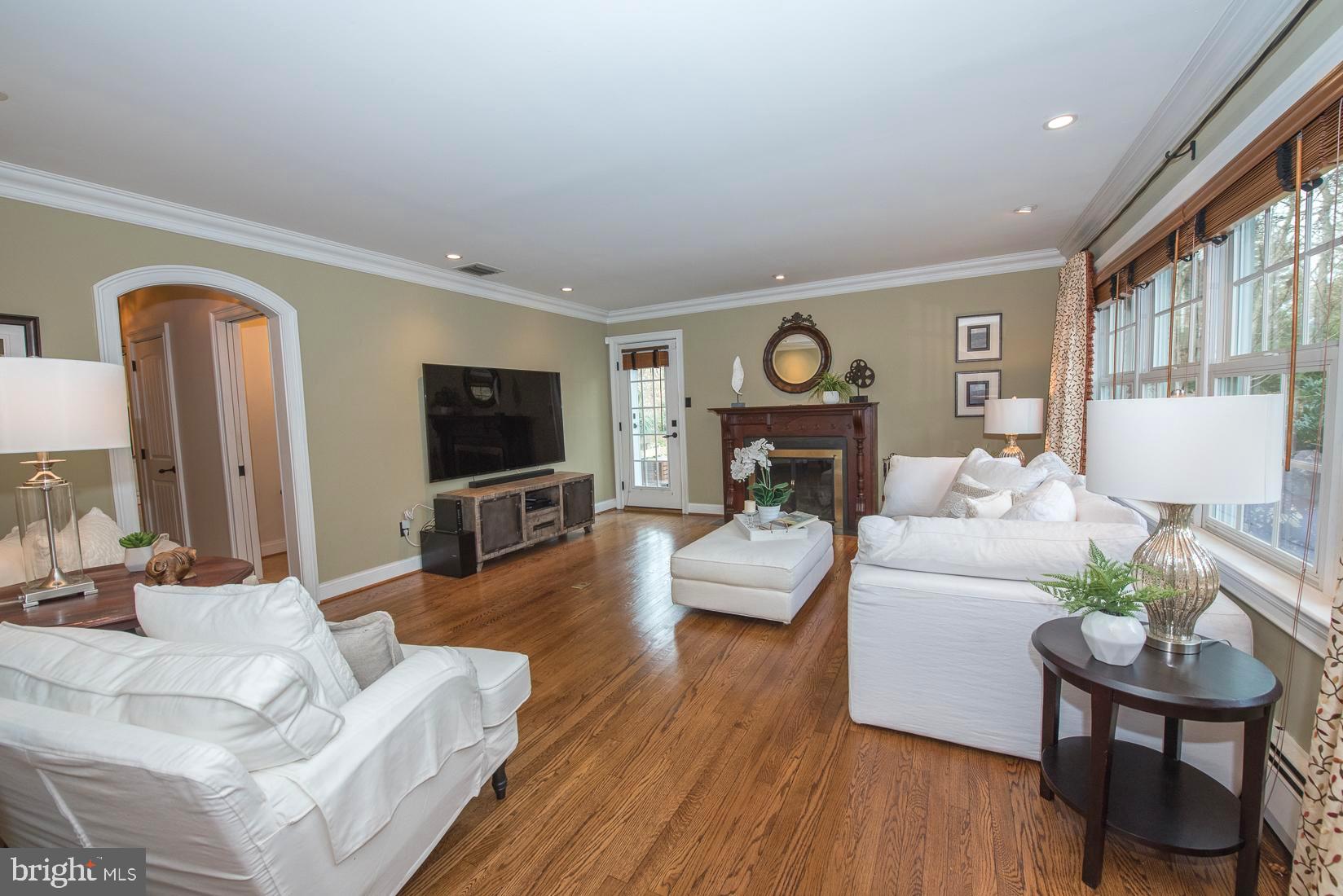 406 Homestead Road Wayne, PA 19087 - Photo 7 of 39 Living Room with exit to side deck
