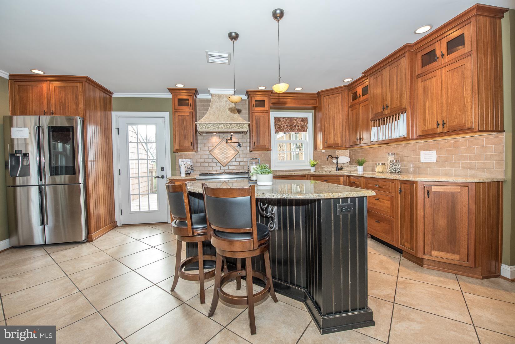 406 Homestead Road Wayne, PA 19087 - Photo 8 of 39 Custom kitchen with access to rear deck