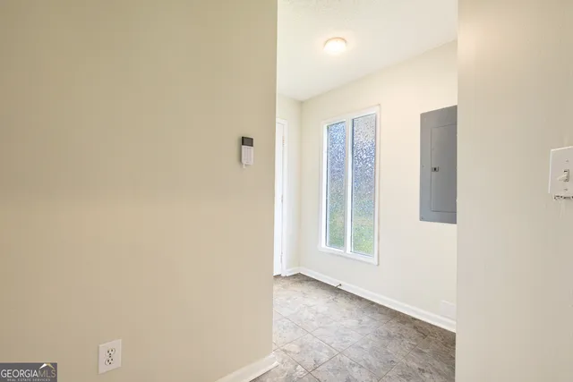 a view of a storage & utility room with washer and dryer