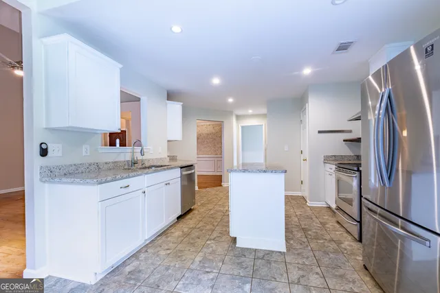 a bedroom with a bed and a closet