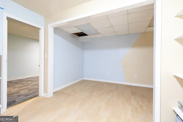 a white bath tub sitting in a bathroom