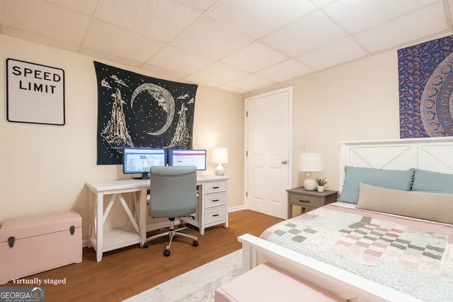 a view of an empty room with a closet