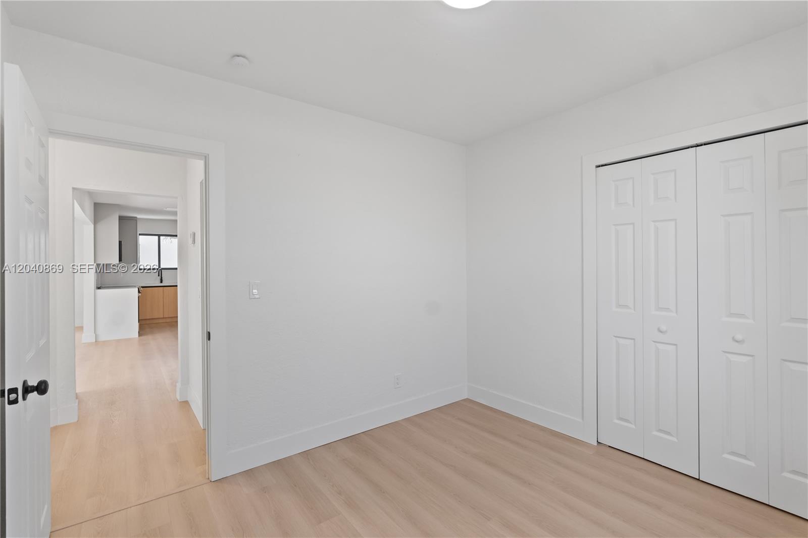 31 West 64th Street Hialeah, FL 33012 - Photo 38 of 49 wooden floor in an empty room