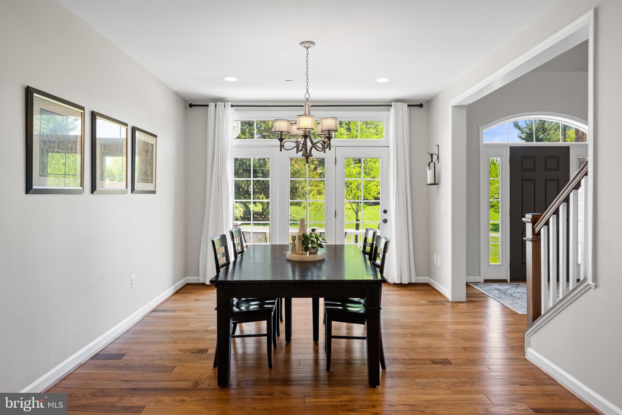 413 Vierling Drive Silver Spring, MD 20904 - Photo 11 of 82 a view of a dining room with furniture window and wooden floor