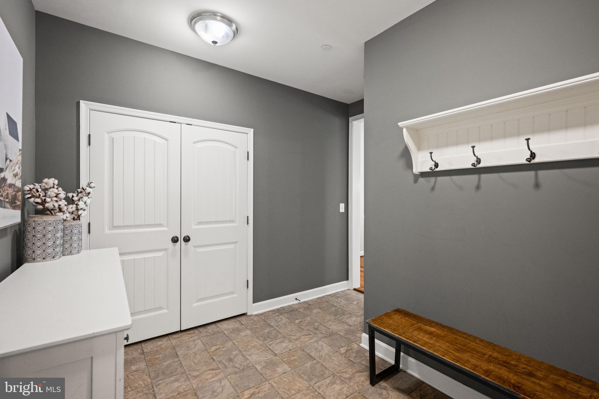 413 Vierling Drive Silver Spring, MD 20904 - Photo 23 of 82 a view of a room with racks on the wall