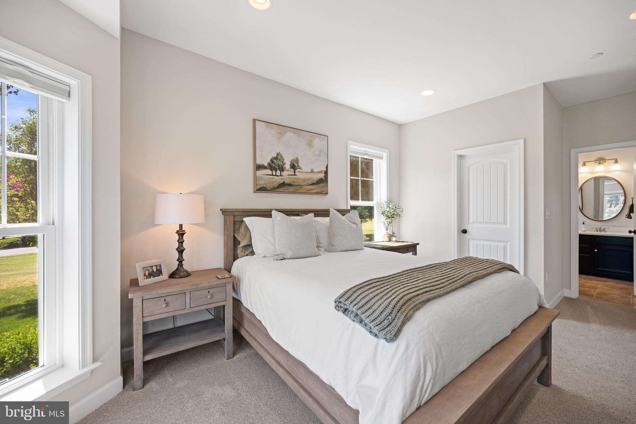 413 Vierling Drive Silver Spring, MD 20904 - Photo 27 of 82 a bedroom with a bed and a painting on the wall