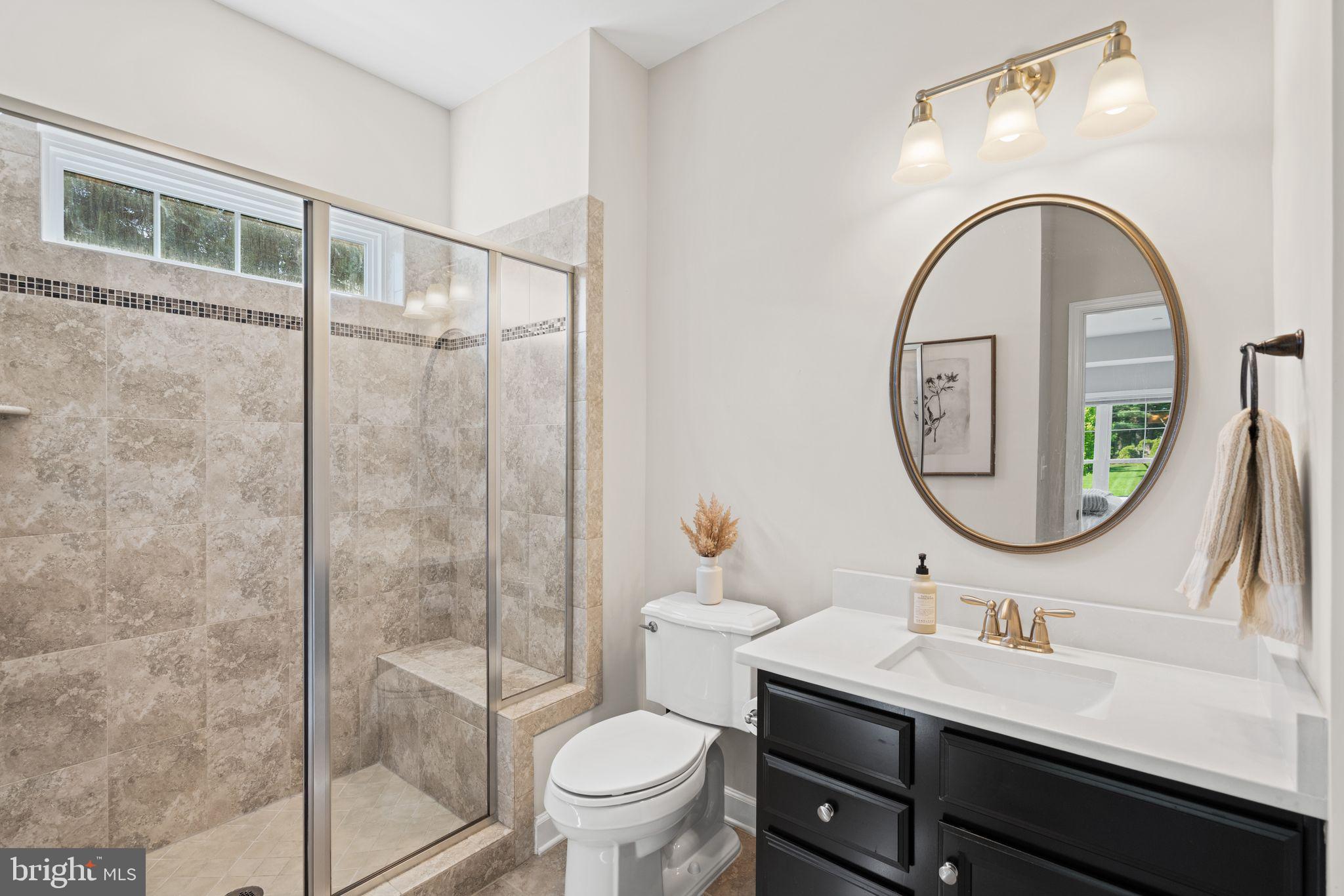 413 Vierling Drive Silver Spring, MD 20904 - Photo 30 of 82 a bathroom with a sink a toilet and a mirror