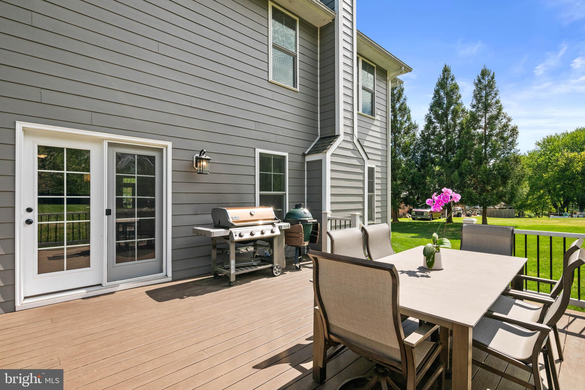 413 Vierling Drive Silver Spring, MD 20904 - Photo 73 of 82 a view of a patio with a table and chairs and potted plants