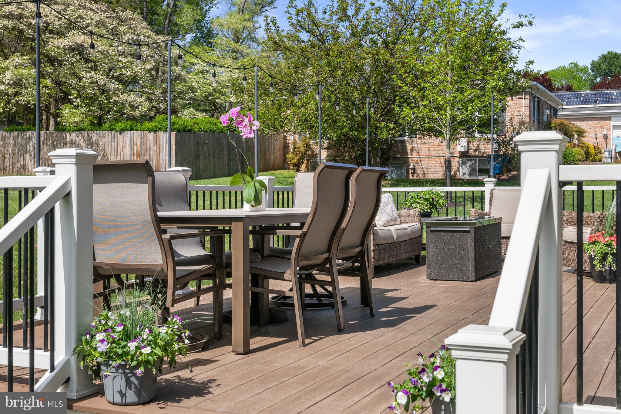 413 Vierling Drive Silver Spring, MD 20904 - Photo 76 of 82 a view of a chairs and table in the patio along with potted plants