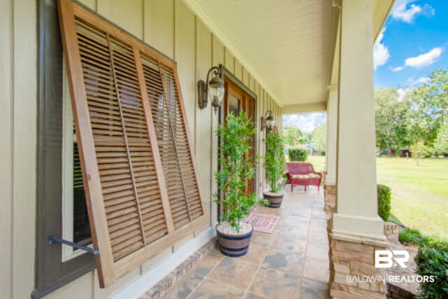 21550 Broad Street Silverhill, AL 36576 - Photo 6 of 45 Cypress Hurricane Shutters