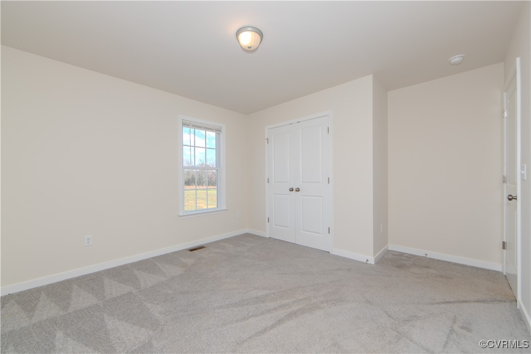 14671 Baltimore Road Dewitt, VA 23840 - Photo 14 of 27 an empty room with a window