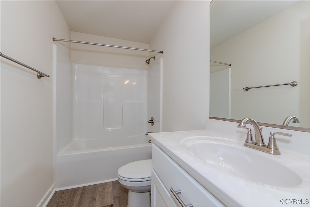 14671 Baltimore Road Dewitt, VA 23840 - Photo 16 of 27 a bathroom with a sink toilet and shower