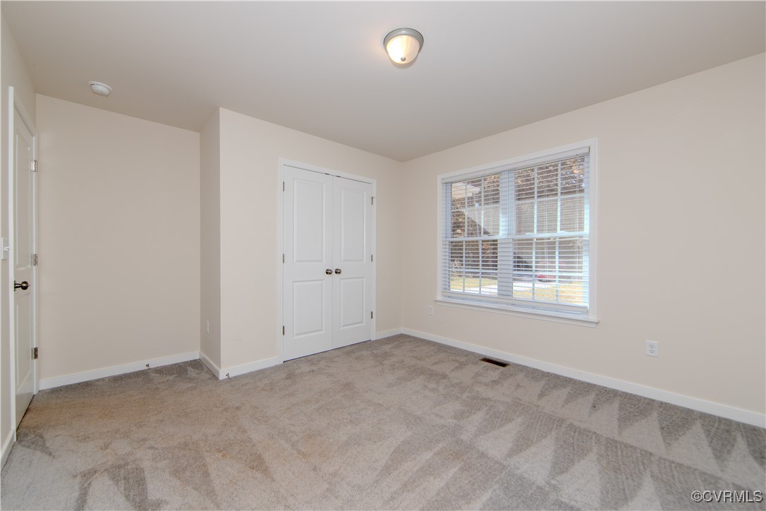 14671 Baltimore Road Dewitt, VA 23840 - Photo 17 of 27 a view of an empty room with a window