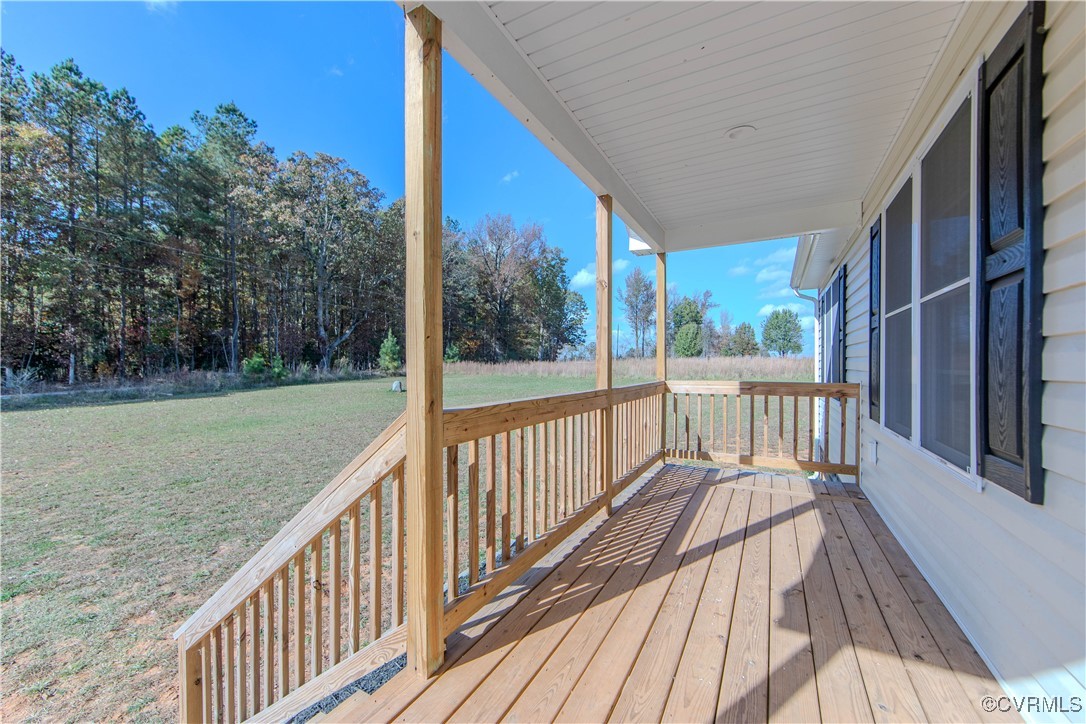 14671 Baltimore Road Dewitt, VA 23840 - Photo 22 of 27 a view of balcony with wooden floor and fence