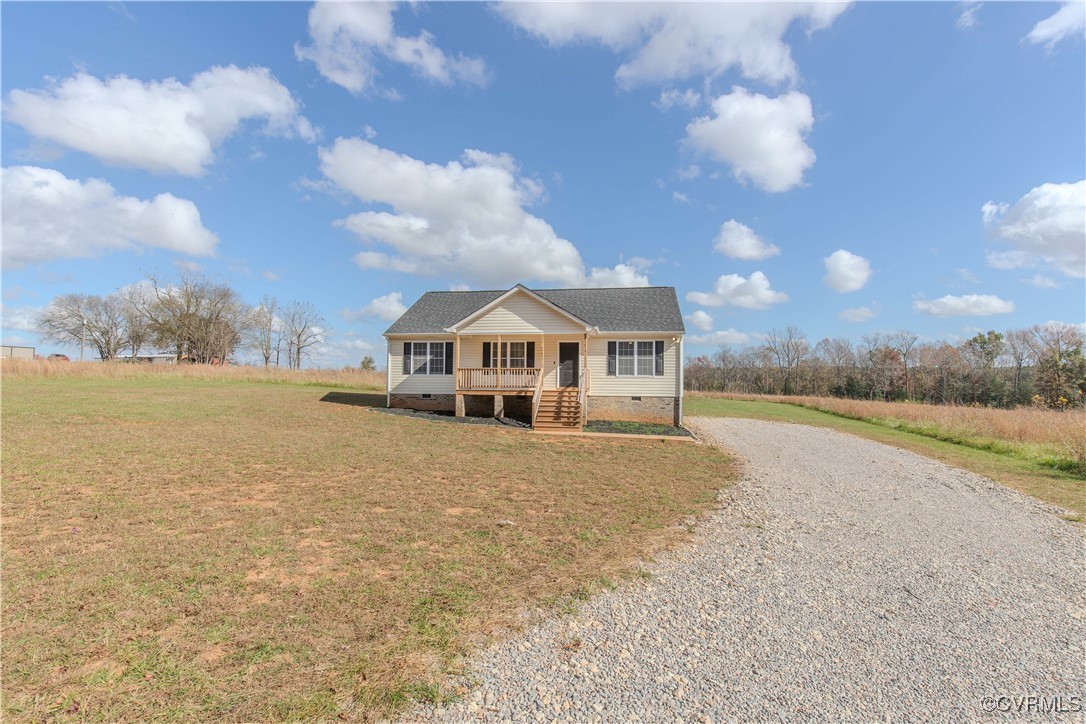 14671 Baltimore Road Dewitt, VA 23840 - Photo 24 of 27 a view of house with yard and green space