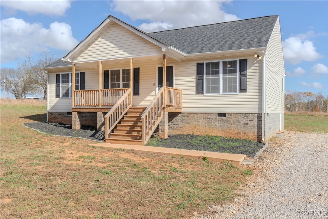 14671 Baltimore Road Dewitt, VA 23840 - Photo 25 of 27 a view of a house with a yard