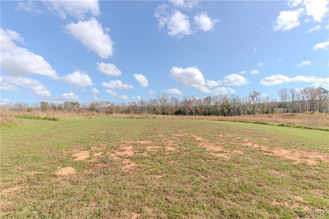 14671 Baltimore Road Dewitt, VA 23840 - Photo 27 of 27 a view of a lake and a yard