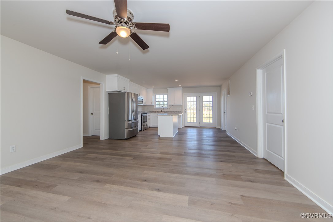 14671 Baltimore Road Dewitt, VA 23840 - Photo 8 of 27 a view of empty room with wooden floor