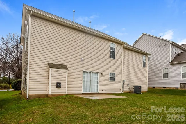 a view of a backyard with a garden