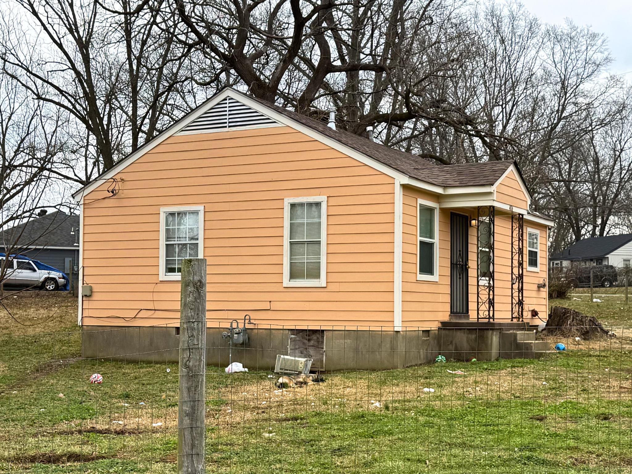 486 Sanford Road Memphis, TN 38109 - Photo 2 of 2 a front view of a house with a yard