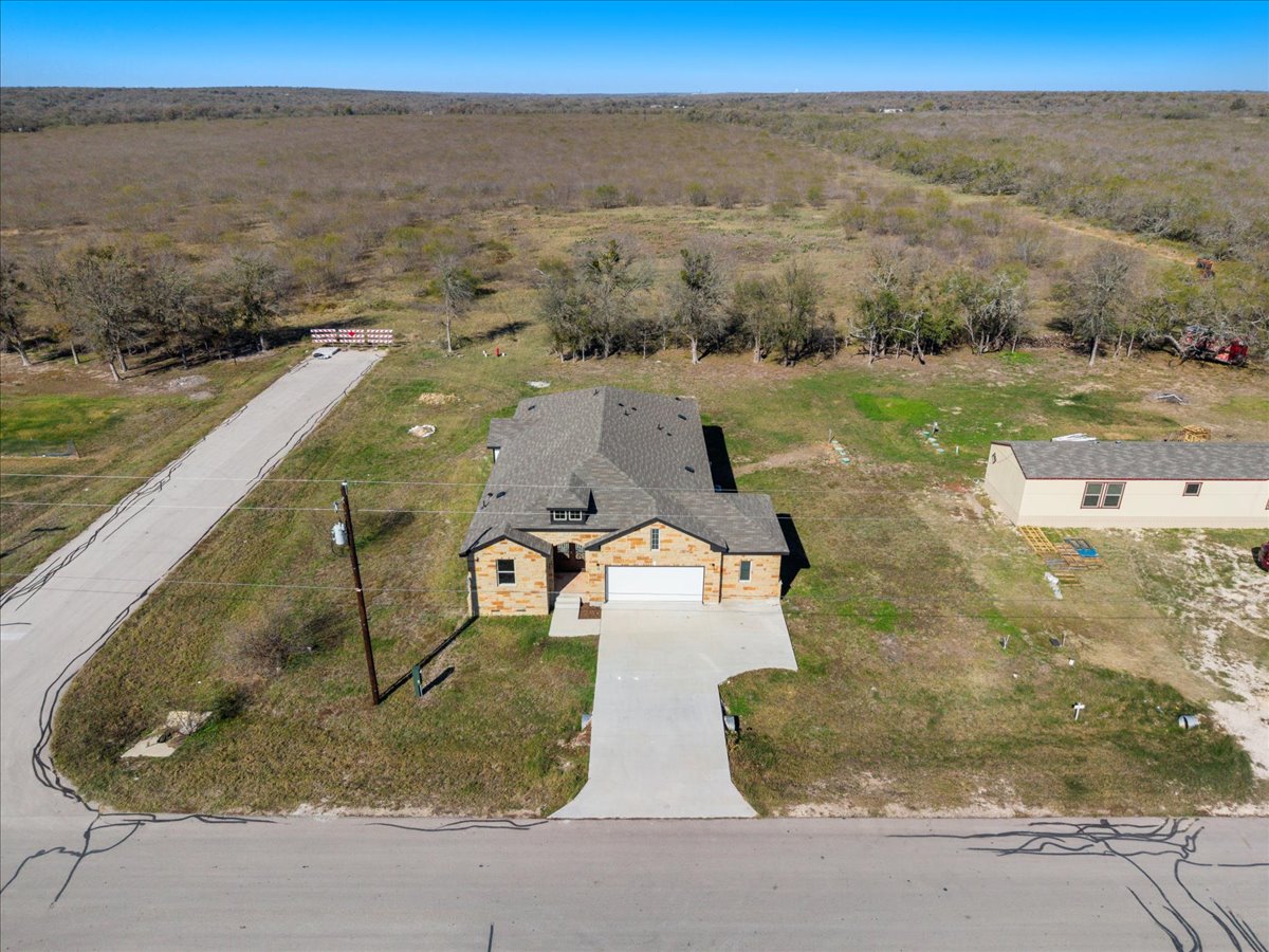 217 Gato Road Cedar Creek, TX 78612 - Photo 3 of 40 a view of a swimming pool with a yard