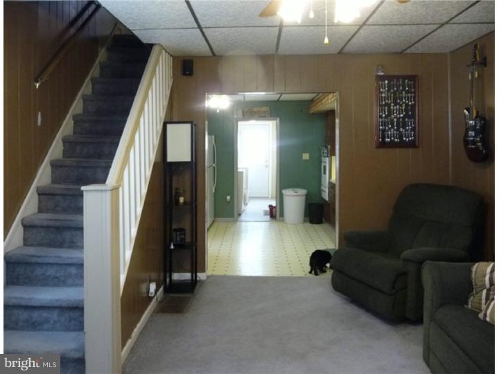 120 Paine Street Riverside, NJ 08075 - Photo 3 of 13 a lobby with furniture and a couch