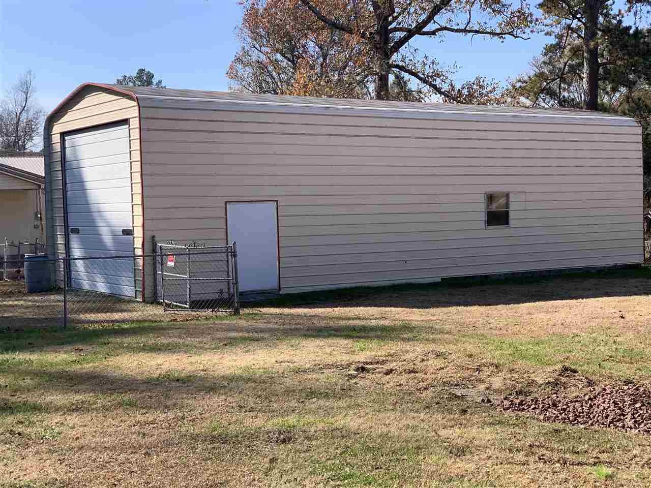 483 Kinser Road Cleveland, TN 37323 - Photo 40 of 40 a view of a backyard with a large tree