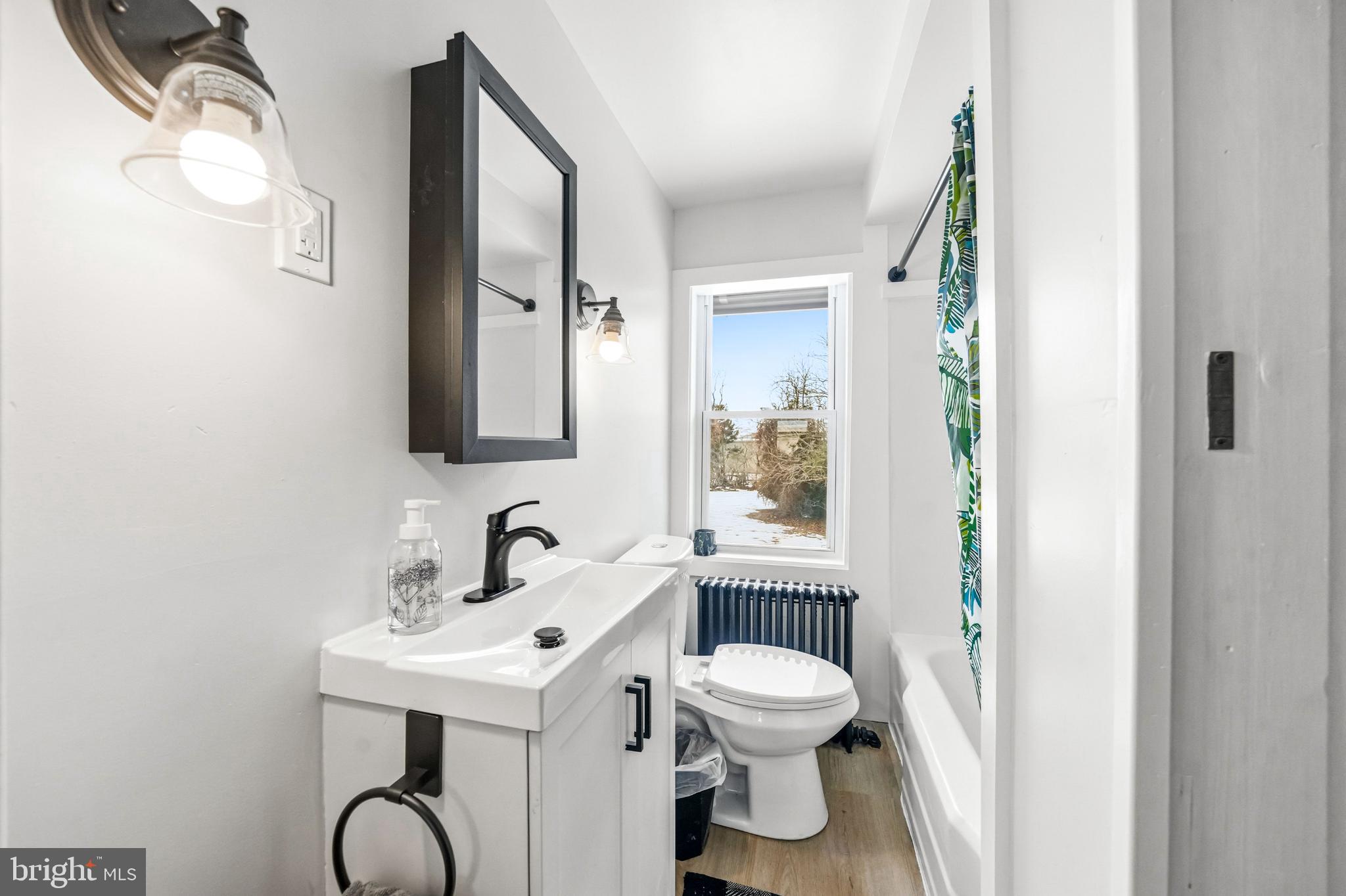 4 Townsend Avenue Bridgeton, NJ 08302 - Photo 16 of 38 Bright and airy bathroom with modern touches.